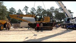 Assembly of Amphibious CAT 320 excavator on EIK Pontoon with Long Reach Front