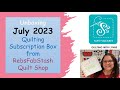 Opening the July 2023 Stash Box from RebsFabStash. This is a subscription box for quilters.