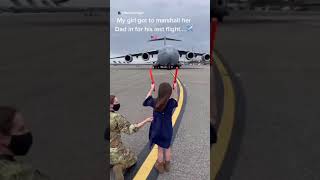 After 20 years of service, little girl marshals her dad in on his last flight