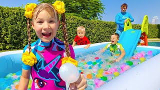 Diana and Roma Water Balloons PlayDate with Baby Oliver