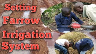 A day in life buying, transporting and setting up furrow irrigation system.