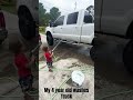 adorable toddler takes truck washing to the next level