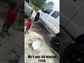 adorable toddler takes truck washing to the next level