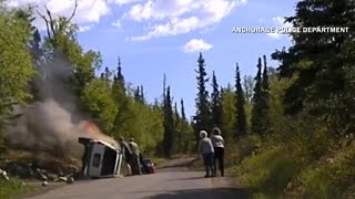Watch: Life-and-death rescue from fiery car