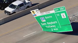 Highway sign over US 75 falls, blocks lanes of traffic