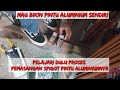 Proses pemasangan spigot pintu aluminium