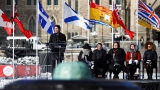 Prime Minister Trudeau speaks at a ceremony unveiling the symbols of Nunavut on the Centennial Flame