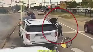 Caught on camera: Woman robbed while stopped at a stoplight in Houston