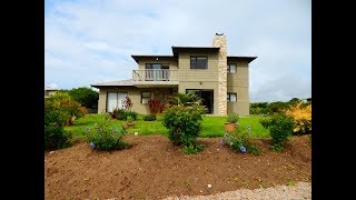 Striking townhouse in prestigious estate in Hartenbos on the Garden Route R2,660,000