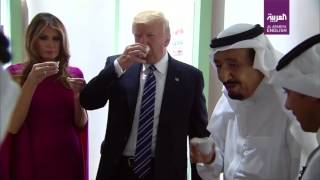 King Salman, Trump and Melania sample traditional Saudi dates and coffee