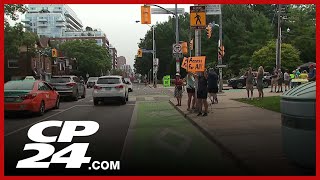 Rally held at High Park to protest car ban