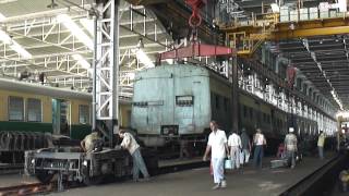 Howrah EMU Carshed:A very heavy motor coach being detached from a set of wheels!!