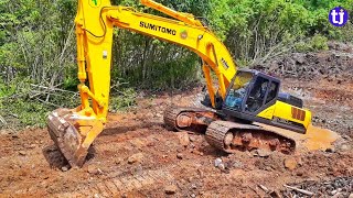 Sumitomo SH 350 LHD Excavator Digging Soil Mixed With Rocks To Create Water Pool in The Project Area