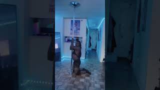 "Watch me defy gravity with every twist and turn in this mesmerizing pole dance routine."