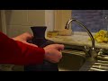 an instructional video on how to fill a hot water bottle safely