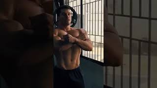 getting shirtless sexy bodybuilder