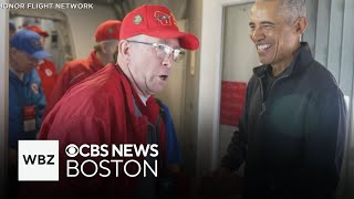 Former President Obama surprises plane full of veterans for Veterans Day