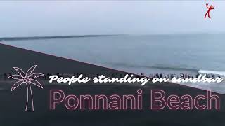 Beautiful View, People standing on sand bar in Ponnani beach,Kerala