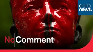 A statue of former Belgian King Baudouin defaced with red paint