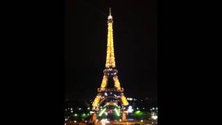 Eiffel Tower sparkling at night in Paris, France