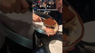 People are being served a piece of tiramisu at Grill Americano in Melbourne!