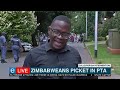 Zimbabweans in SA picket outside commissioner's office