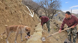 The daily life of the nomadic family of Shamsullah: pouring soil and cooking traditional food o fire