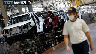 Toyota profits plunge 21% as chip shortage hits production