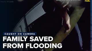 Deputies release body cam footage rescuing family from flooded home