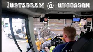 Volvo L90H lossar trailer med pall del 2/L90H loader unloading pallets from trailer part 2