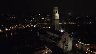 Flying over Verona at night