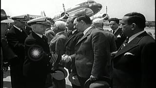 Dignitaries and officials get off from an aircraft and are greeted by a Navy offi...HD Stock Footage