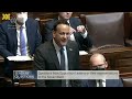 leo varadkar and michael healy rae have heated exchange in the dáil