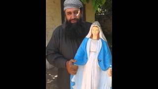 Muslim Cleric Smashes Statue of Virgin Mary