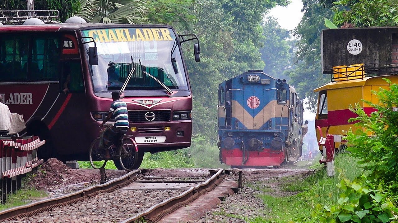 Train Passing Through A Busy Rail Crossing/ Gate- Benapole Commuter Of ...