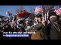 yoon s supporters face off with police in south korea afp