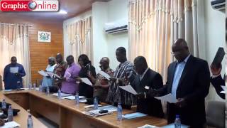 Administering oath of office to the new Ghana National Fire Service Council Members.