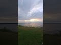 Lori Ramirez enjoying sunset on Cayuga Lake,  New York, USA