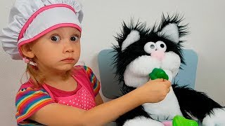Alena plays with funny Toy Cat