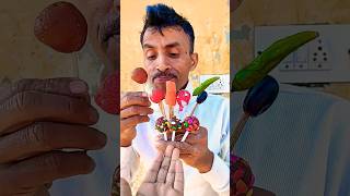 Chocolate lollipop 🍭 aur rasgulla sweets 😛#mirchi🌶️#grappes🍇#lollipop#viral#funny#shortsfeed