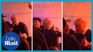 Bizarre moment Boris Johnson leads New Year's Eve countdown at local pub