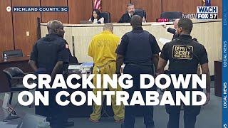 Cracking down on contraband: 12 charged in prison scandal