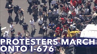 Protesters march onto I-676, portion of highway temporarily closed in Philadelphia