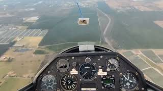 two gliding instructors practicing spins in an IS28