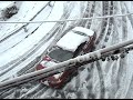 cars sliding down a snowy hill in yonkers