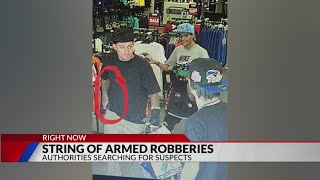 Suspects wanted in a string of armed robberies