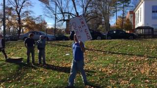 Trump supporter outside Amherst High School argues with students that walked out