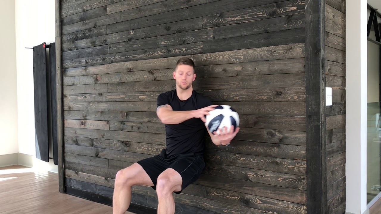 Wall Sit Medicine Ball Rotations - YouTube