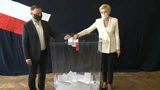 Polish president Andrzej Duda votes in presidential election | AFP
