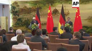 German, China FMs hold presser in Beijing